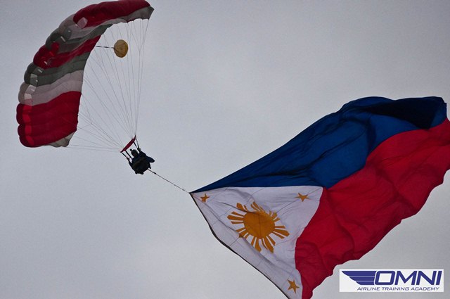 pihabf22 flag jump omni aviation.jpg