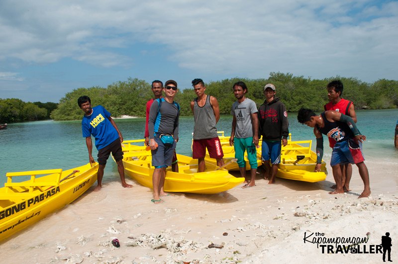 yellow boat paddlers in zamboanga city.jpg